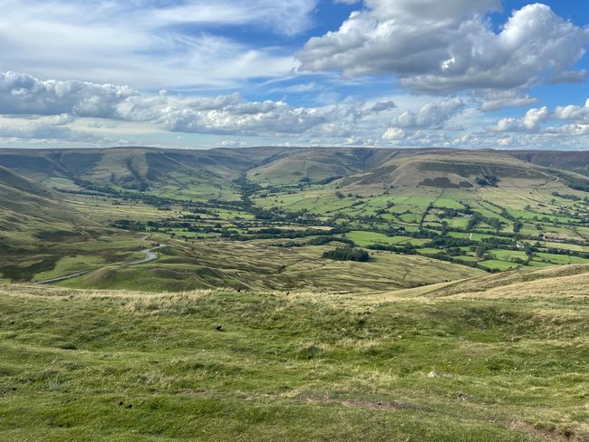 A circle of moutains and hills with a valley in the center